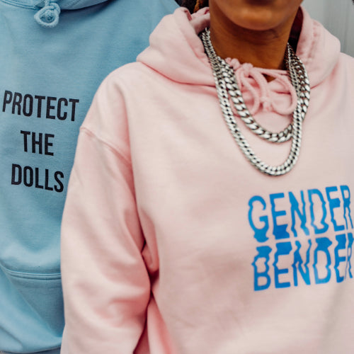 Two people wearing hoodies